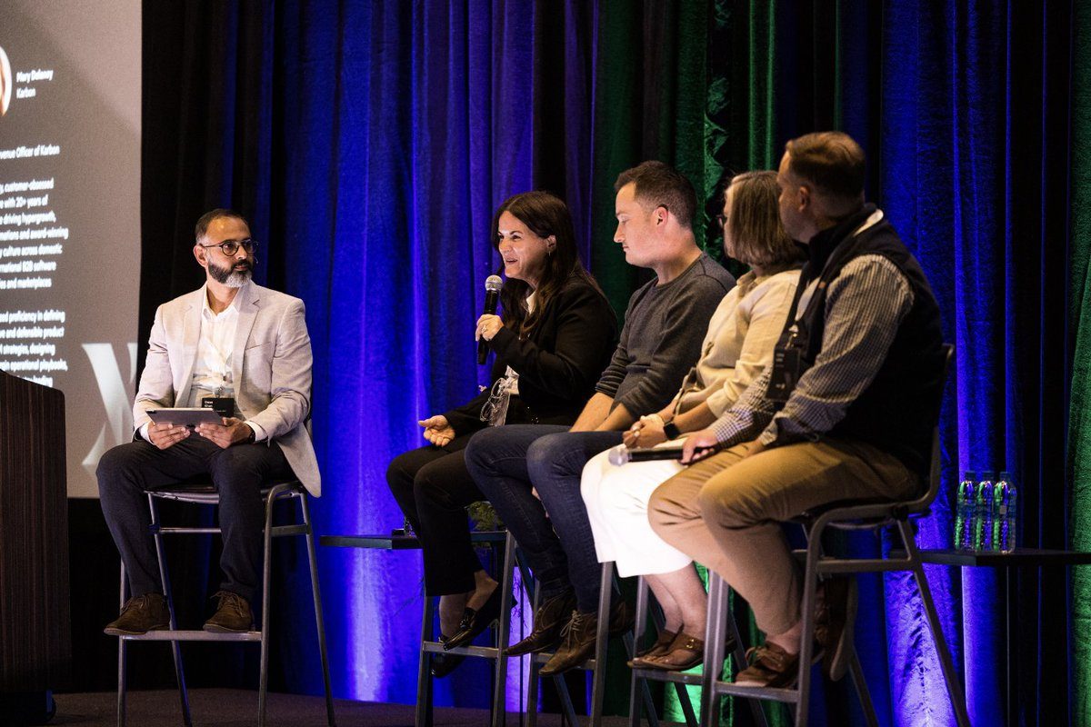 Omer moderating an industry panel